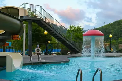 Outdoor pool with water slide