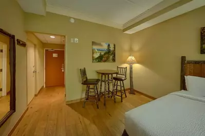 chairs and table in hotel room