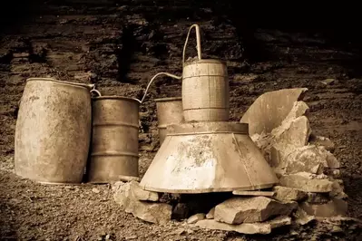 An old moonshine still on some rocks.