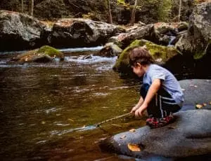 Kid playing in the national park