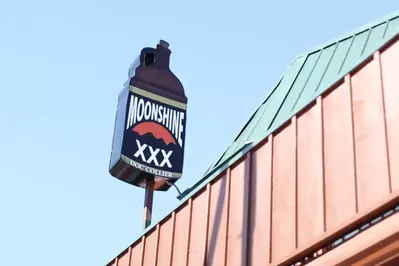 The sign for Doc Collier Moonshine in Gatlinburg.